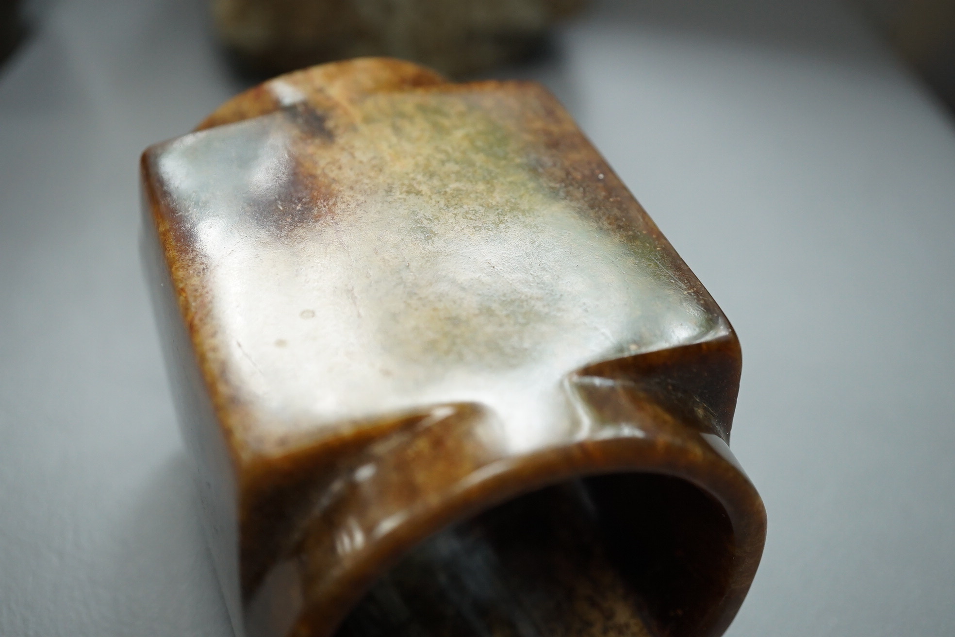 Four Chinese archaistic jade or hardstone cong
